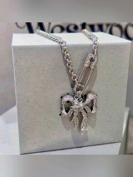 Vivienne Westwood Jewelry - Vivienne Westwood Silver Bow Pendant Necklace with Sparkling Stones